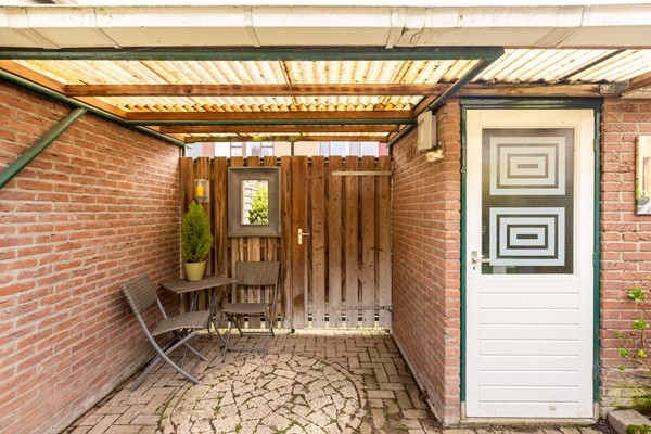 Foto - Te koop: tussenwoning gelegen aan groenvoorziening